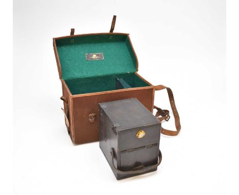 A Ross &amp; Co quarter plate camera, black leather-bound body with flip-up top viewfinder, twin lenses with Bausch &amp; Lom