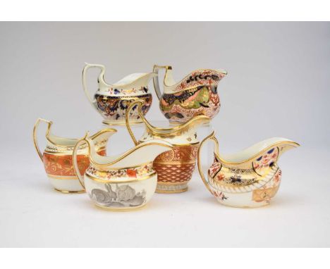 A group of six assorted English cream jugs, early 19th centurycomprising two Spode imari jugs, a further Spode bat-printed ju