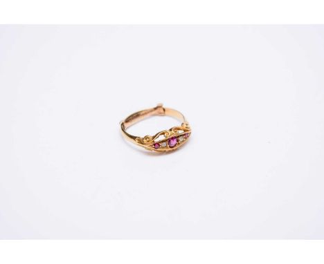 An early 20th century 18ct gold graduated five stone ruby and diamond ring, hallmarked Birmingham 1910, size N 1/2, weight ap