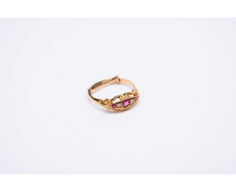 An early 20th century 18ct gold graduated five stone ruby and diamond ring, hallmarked Birmingham 1910, size N 1/2, weight ap