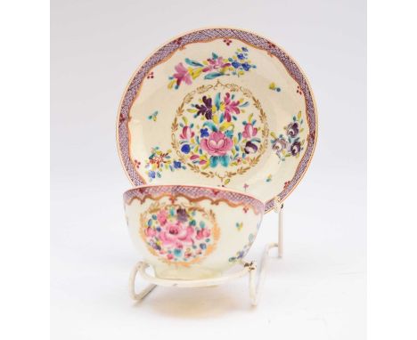 A Worcester 'Compagnie des Indes' pattern tea bowl and saucer, circa 1775, enamelled in the famille rose palette with bouquet