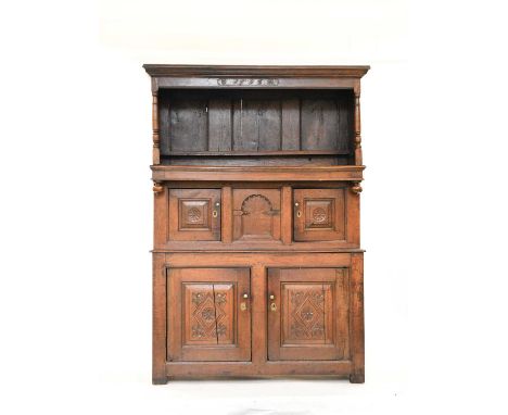 A 17th/18th century and later oak tridarn, the canopy with a cyma recta cornice above turned supports, the base with a centra