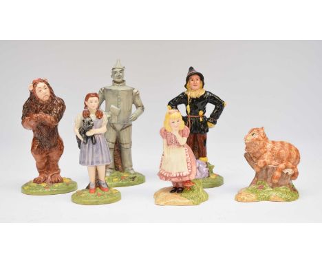 A set of four Royal Doulton Wizard of Oz limited edition figures, numbered out of 1500 pieces, comprising Lion, Tinman, Scare