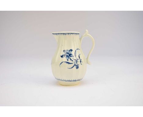 A Worcester Daffodfil sparrow beak jug, circa 1770, of ribbed form, painted in underglaze blue with the main flower and two f