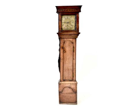 An 18th century vernacular, 30-hour longcase clock by John Tibbott, the scotia cornice above a square door, enclosing an 11" 