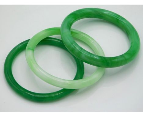 A set of three Chinese jade bangles, 124.1g