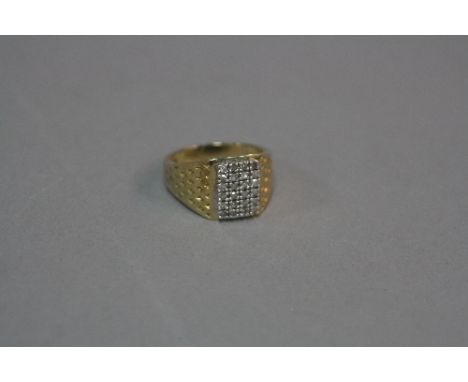 A MODERN GENTS 9CT GOLD DIAMOND SET SIGNET RING, rectangular shaped head, estimated total diamond weight 0.30ct colour assess