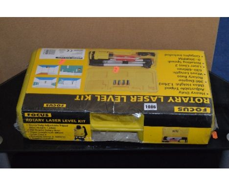 A BRAND NEW IN BOX FOCUS ROTARY LASER LEVEL KIT