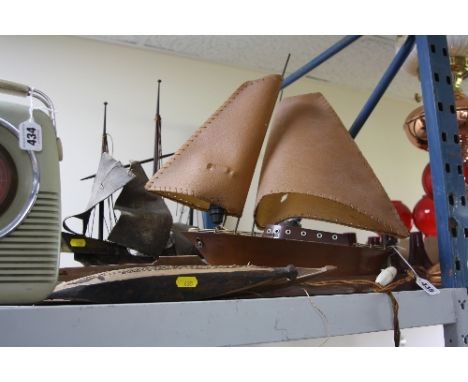 A TABLE LAMP IN THE FORM OF A SHIP, together with a model galleon and two other wooden boats (4)