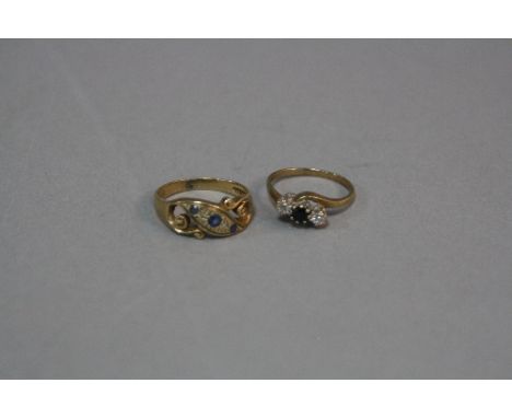 TWO LATE 20TH CENTURY SAPPHIRE AND DIAMOND DRESS RINGS, one scroll design, ring size N, hallmarked, Birmingham1994, a three s