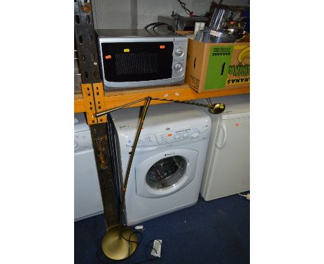 A HOTPOINT WF541 WASHING MACHINE, silver microwave and a modern standard reading lamp (3) 