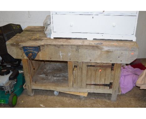 A WOODEN WORK BENCH, with cupboard and a Record vice attached, approximate size width153cm x depth 26cm x height 81cm