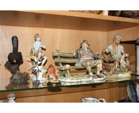 SEVEN VARIOUS ORNAMENTS, to include Capodimonte Tramp on bench, impressed I P A mark (slight chips) Beswick Robin (reglued be