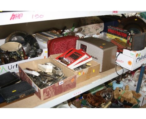 FIVE BOXES OF METALWARE, CUTLERY, vintage and modern board games, HMV radio, table lamp, etc (five boxes and loose)