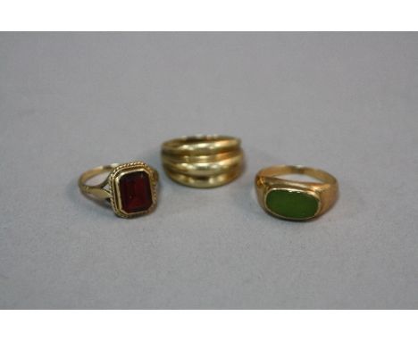 A COLLECTION OF RINGS, to include a modern jade signet ring, oval nephrite jade measuring approximately 11.7 x 7mm, ring size