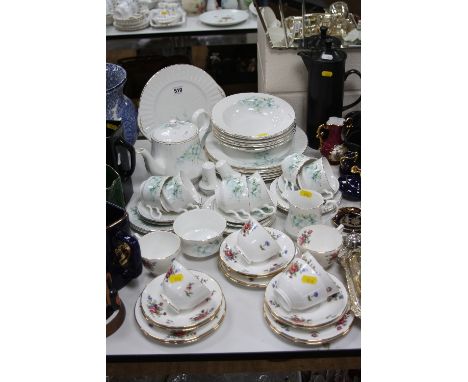 A ROYAL STAFFORD PART DINNER SERVICE, floral design and six Crown Staffordshire cups, saucers and tea plates