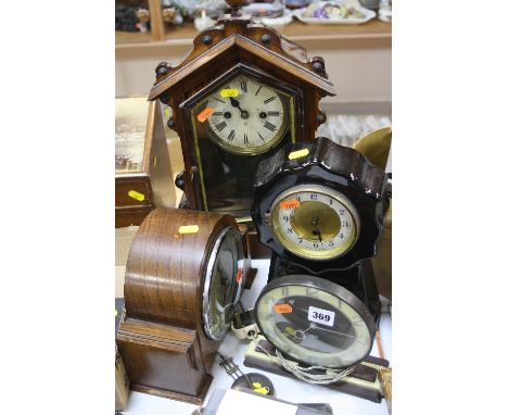 A SMITHS ELECTRIC BAKELITE CLOCK, a ceramic mantel clock (no key or pendulum), two other clocks (one with key and pendulum) (