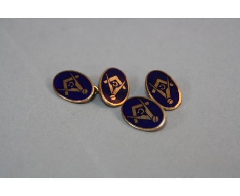 A MID - 20TH CENTURY 9CT GOLD PAIR OF MASONIC CUFFLINKS, oval blue enamelled square and compass, each oval measuring approxim