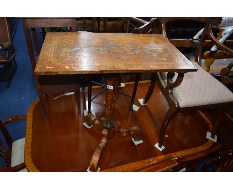 A VICTORIAN HEAVILY INLAID TRIPOD TABLE (in need of restoration) 