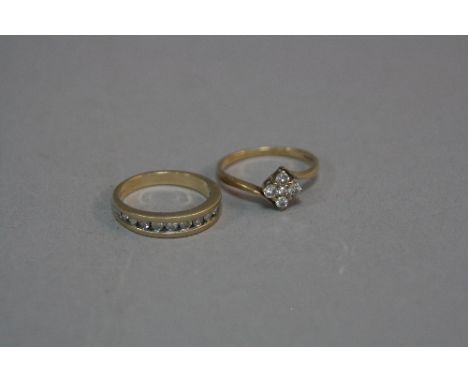 A 9CT DIAMOND HALF ETERNITY RING, ring size M and a 9ct diamond cluster ring, ring size O, approximate weight 4.9 grams (2)