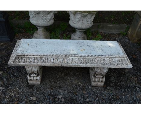 A PAINTED PRE-CAST GARDEN BENCH ON SEPERATE LEGS, approximate length 132cm (sd)