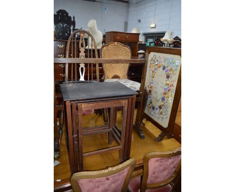 A MAHOGANY FRAMED NEEDLEWORK FIRESCREEN, an oak nest of three tables, a towel rail and two chairs (5)
