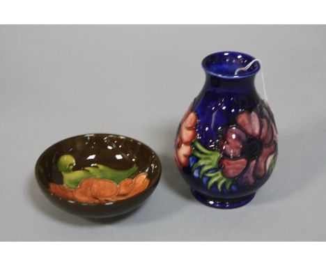 TWO PIECES OF MOORCROFT POTTERY, to include small 'Anemone' vase on blue ground, impressed and signature to base, approximate