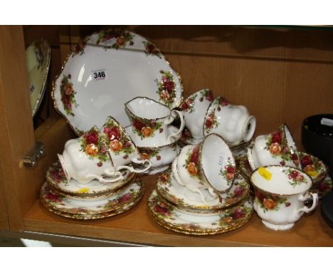 ROYAL ALBERT 'OLD COUNTRY ROSES' TEAWARES, to include cake plate, milk jug, seven cups (one chipped to foot), eight saucers (