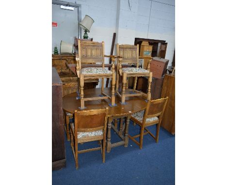 AN OLD CHARM OAK OVAL TOPPED GATE LEG TABLE, and six matching chairs including two carvers (sd) (7)