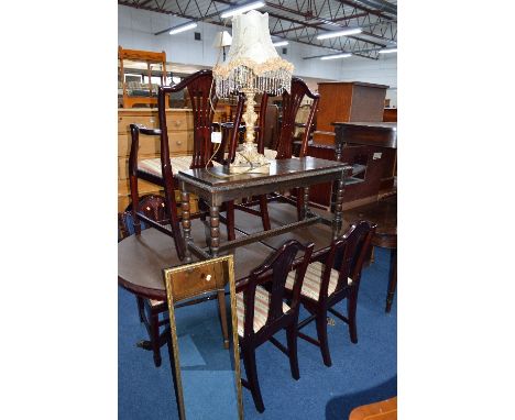 A CARVED OAK COFFEE TABLE, on a stretched support, a gilt mirror, a table lamp with shade etc (4)