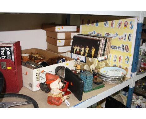 TWO BOXES AND LOOSE SUNDRY ITEMS, to include novelty money banks 'Trick Dog', 'Artillery Bank', collectors plate, records, ba