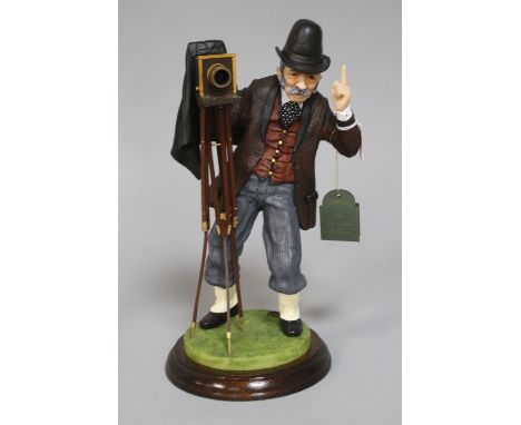 A DENNIS FAIRWEATHER FIGURINE, Country Photographer with camera