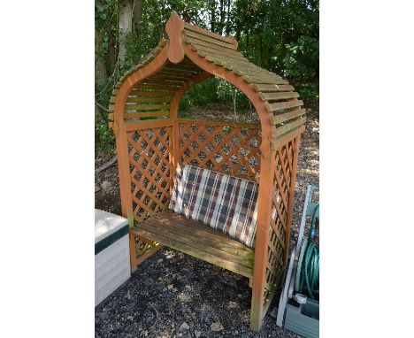 A PAINTED TEAK GARDEN ARBOUR/BENCH, approximate size height 208cm x width 135cm x depth 80cm