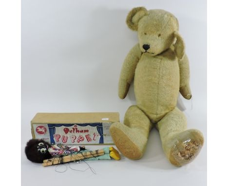 An early 20th century plush Teddy bear, with growler and articulated limbs, 80cm, together with a Golly Pelham puppet