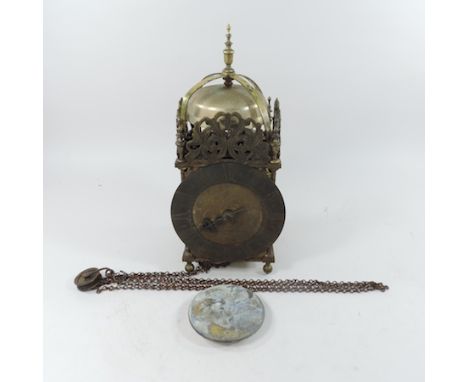 A reproduction brass lantern clock, 38cm high