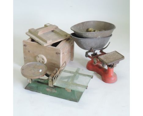 An antique wooden butter churn, 34cm, together with two sets of scales   