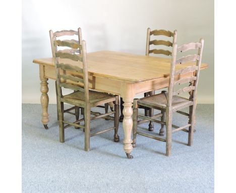 A 19th century pine and ash kitchen table, 142 x 107cm, together with four rush seated ladder back dining chairs