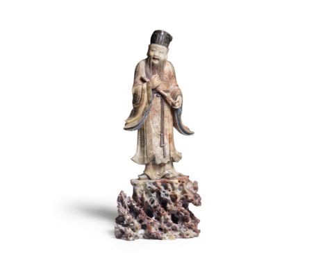 A LARGE SOAPSTONE FIGURE OF ZHANG GUOLAO17th/18th century The Immortal finely carved standing on rockwork, with a long beard 