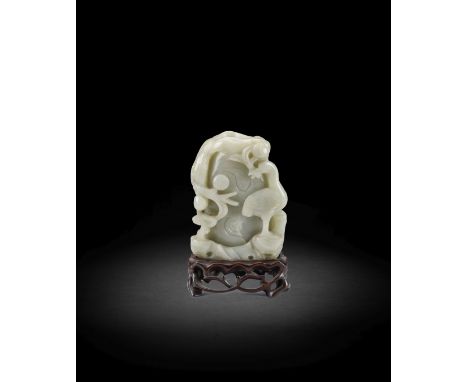 A CARVED PALE GREEN JADE 'CRANE AND LINGZHI' VASE17th/18th century The vase finely carved in the form of a gnarled tree trunk