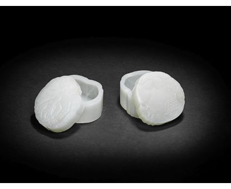 A FINE PAIR OF WHITE JADE 'POMEGRANATE AND FINGER CITRON' BOXES AND COVERS18th centuryCrisply carved each with straight sides