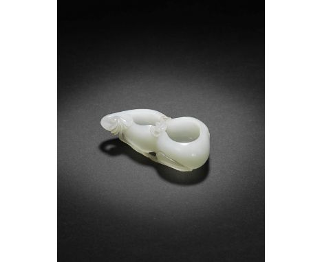 A FINE WHITE JADE 'DOUBLE-GOURD' WASHER18th century The even white stone finely pierced and carved in the form of a double-go