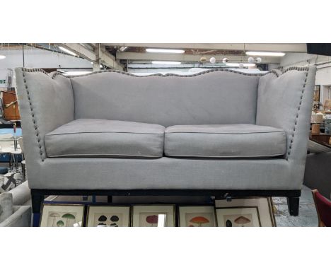 SOFA, two seater, grey upholstered, studded frame, with two loose back cushions, shaped back, 74cm H x 166cm W x 91cm D. 