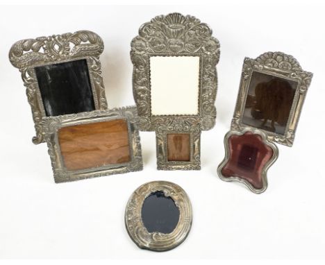 PICTURE FRAMES, a collection of seven mostly silver. (7) 