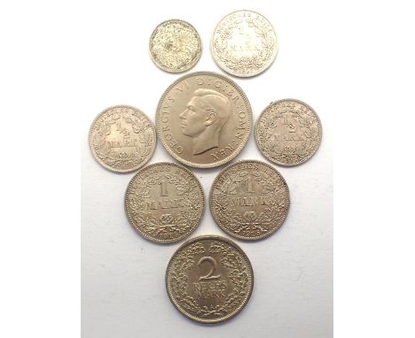 Eight world silver coins, mostly EF grade. P&amp;P Group 0 (£5+VAT for the first lot and £1+VAT for subsequent lots) 