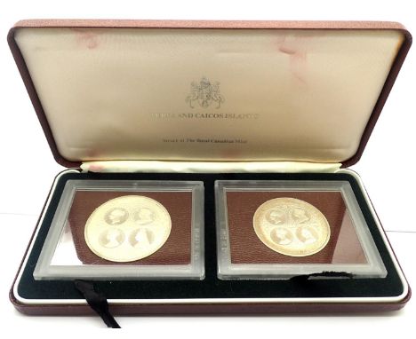 Turks &amp; Caicos Islands cased two 20 crowns. P&amp;P Group 0 (£5+VAT for the first lot and £1+VAT for subsequent lots) 