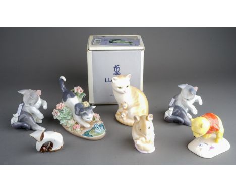 Three various Lladro cats, models to include a pair of Cat and Mouse, 05236, one boxed and Cat with Frog together with Royal 