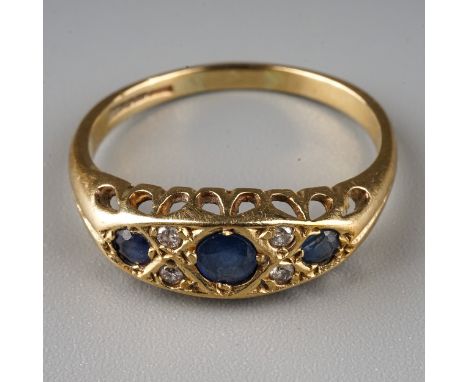 A 9ct yellow gold sapphire and diamond ring, size P, gross weight approx 2.4g 