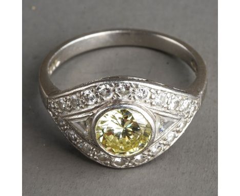 Platinum Diamond and Fancy Yellow Diamond Ring, hallmarked to shank London 1994, approx 1 ct to centre yellow diamond /spread