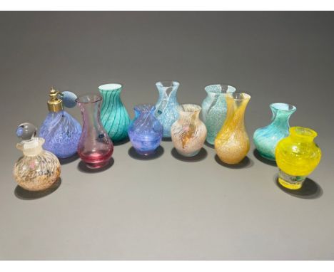 A collection of Caithness glass posy vases, perfume bottle and atomiser, crackle or speckled with white,  varying designs and