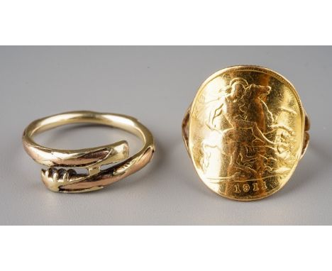 A yellow gold ring, set with a 1911 half sovereign mounted on an unmarked yellow gold shank, size N1/, approx 4.6g; and an un